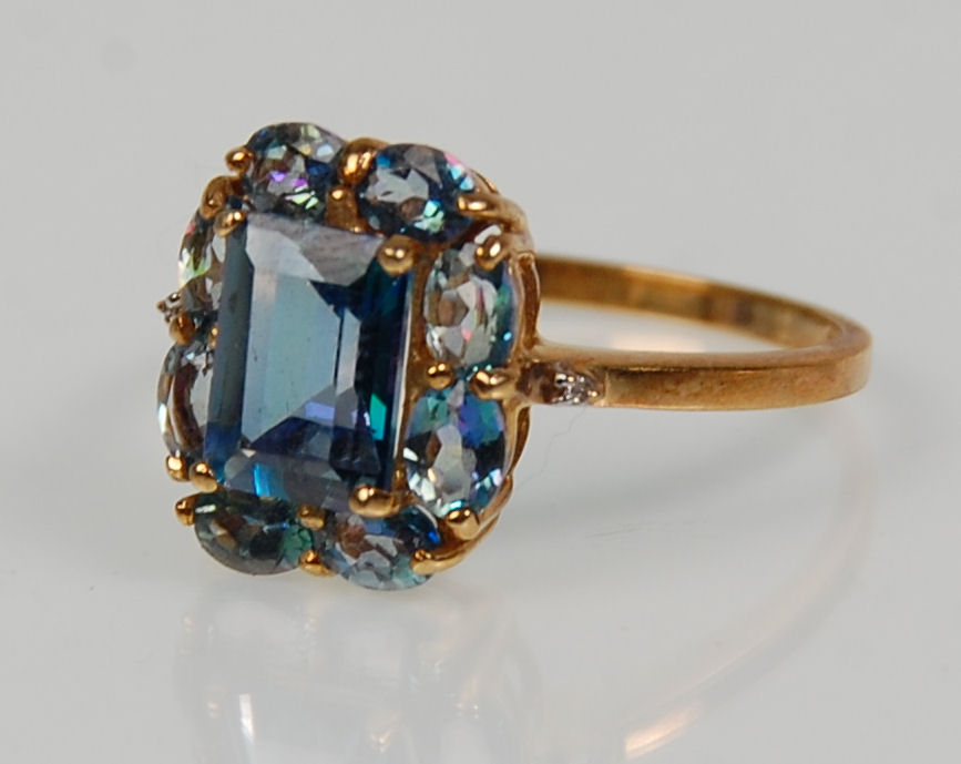 Two 9ct yellow ladies dress rings. One set with a large square faceted cut blue stone surround by - Image 9 of 12