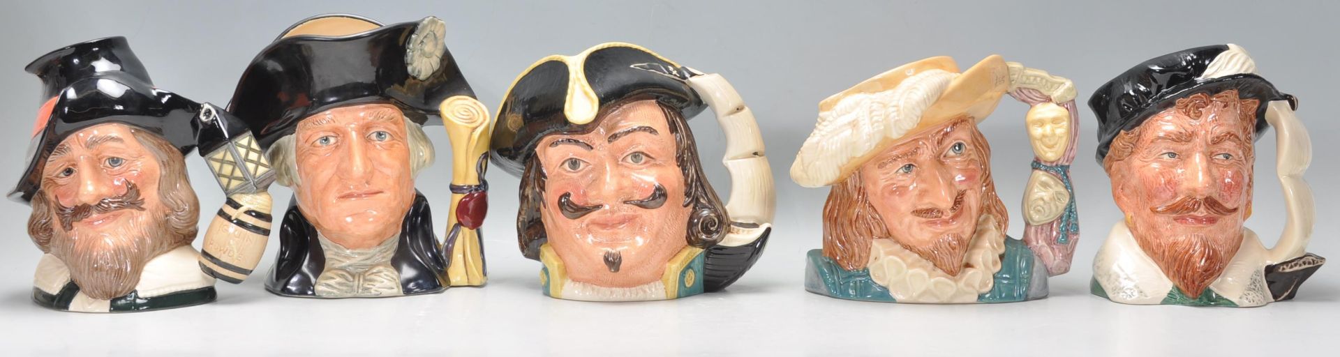 A group of five Royal Doulton character jugs to include Guy Fawkes D6861, George Washington D6669,