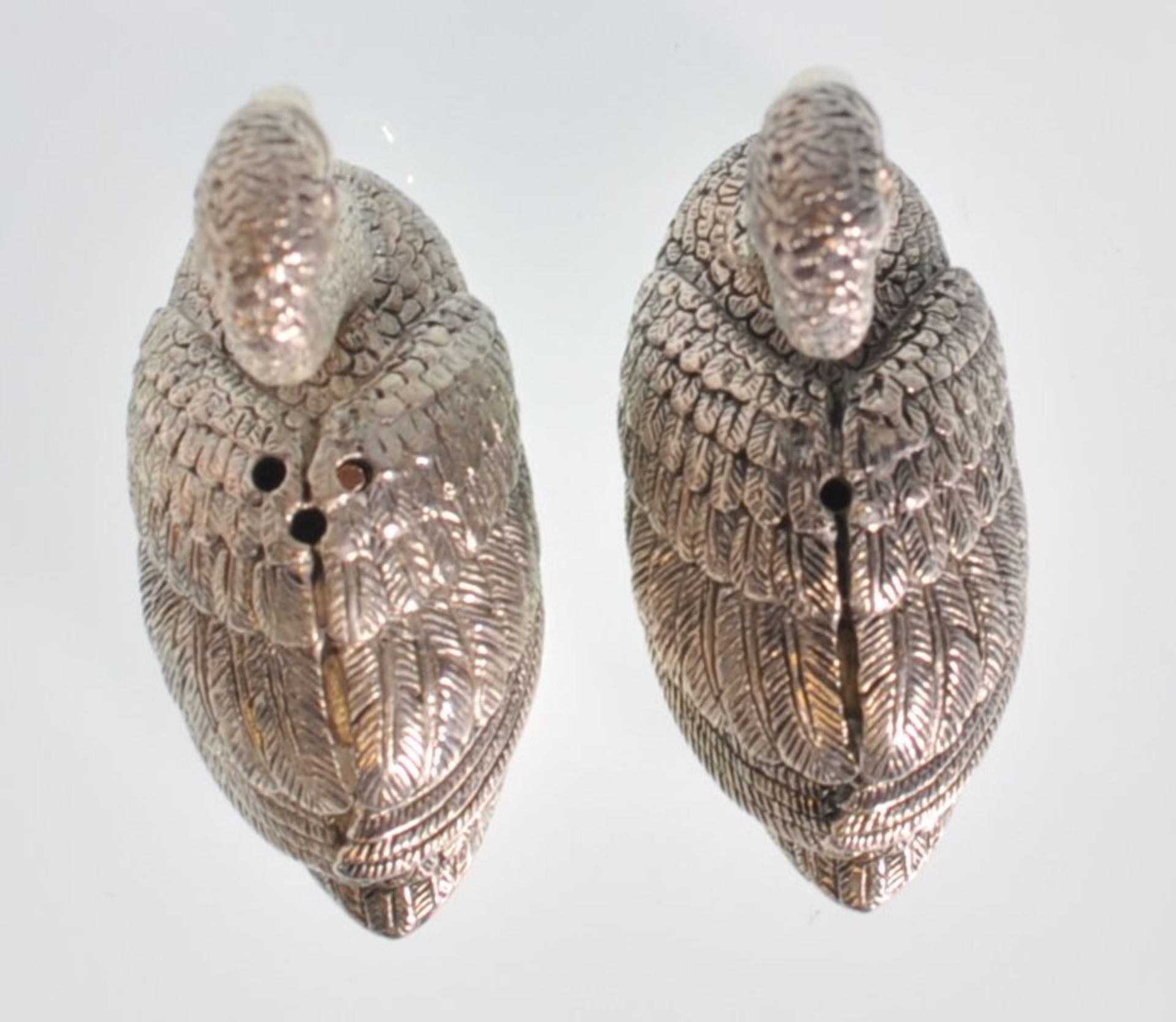 A pair of stamped 925 silver condiments in the form of swans having raised details and set with - Image 5 of 6
