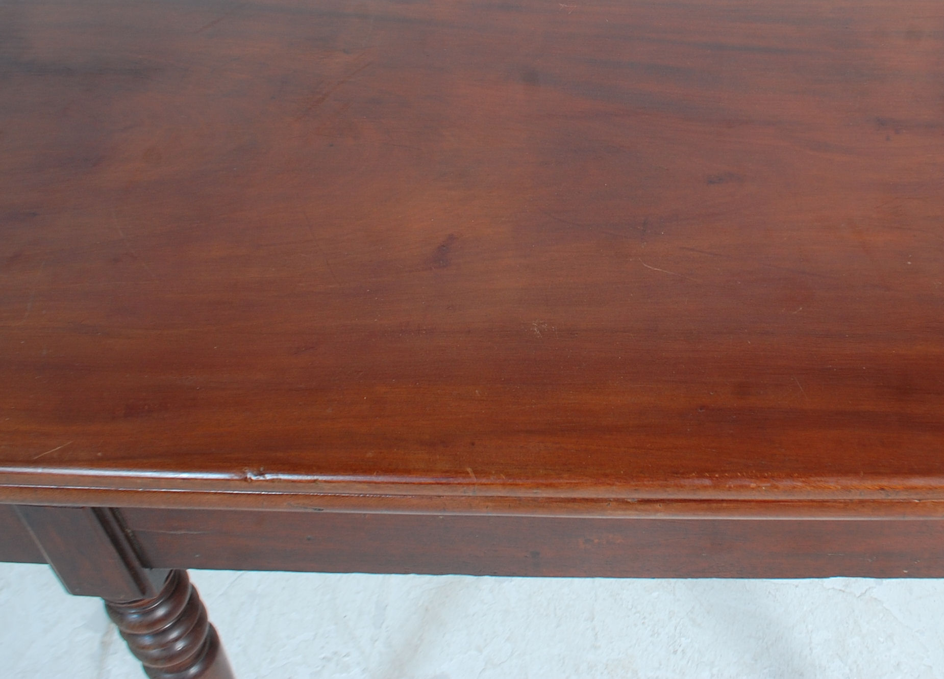 A 19th Century mahogany card / tea table having a folding and revolving top with brass fittings - Image 7 of 7