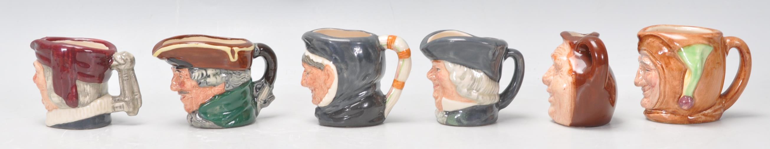 A group of Royal six Doulton miniature Character / Toby jugs to include Simon The Cellarer D6956, - Image 4 of 8