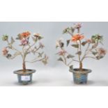 A pair of 19th Century Chinese bonsai tree ornaments having cloisonne pots of round form with