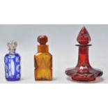 A group of three antique perfume scent bottle to include a 19th Century Victorian blue flash glass