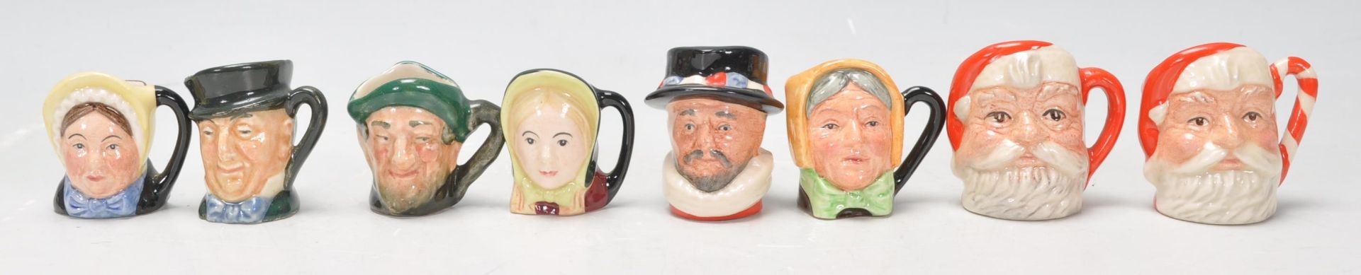 A group of eight Royal Doulton miniature character jugs to include Betsy Trotwood, Little Nell,