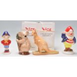 A group of four ceramic Wade figures to include Noddy figure and Big Ears both Limited Edition of