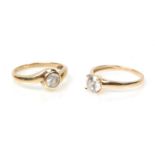 Two 9ct gold ladies rings to include a crossover ring set with a white stone (hallmarked Birmingham,
