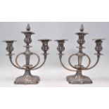 A good pair of vintage 20th Century Meriden Silverplate candlesticks having twin branches with