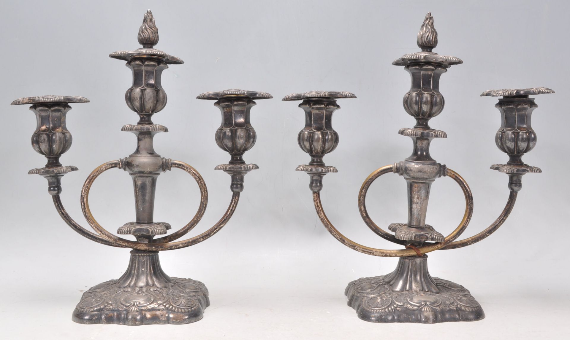 A good pair of vintage 20th Century Meriden Silverplate candlesticks having twin branches with