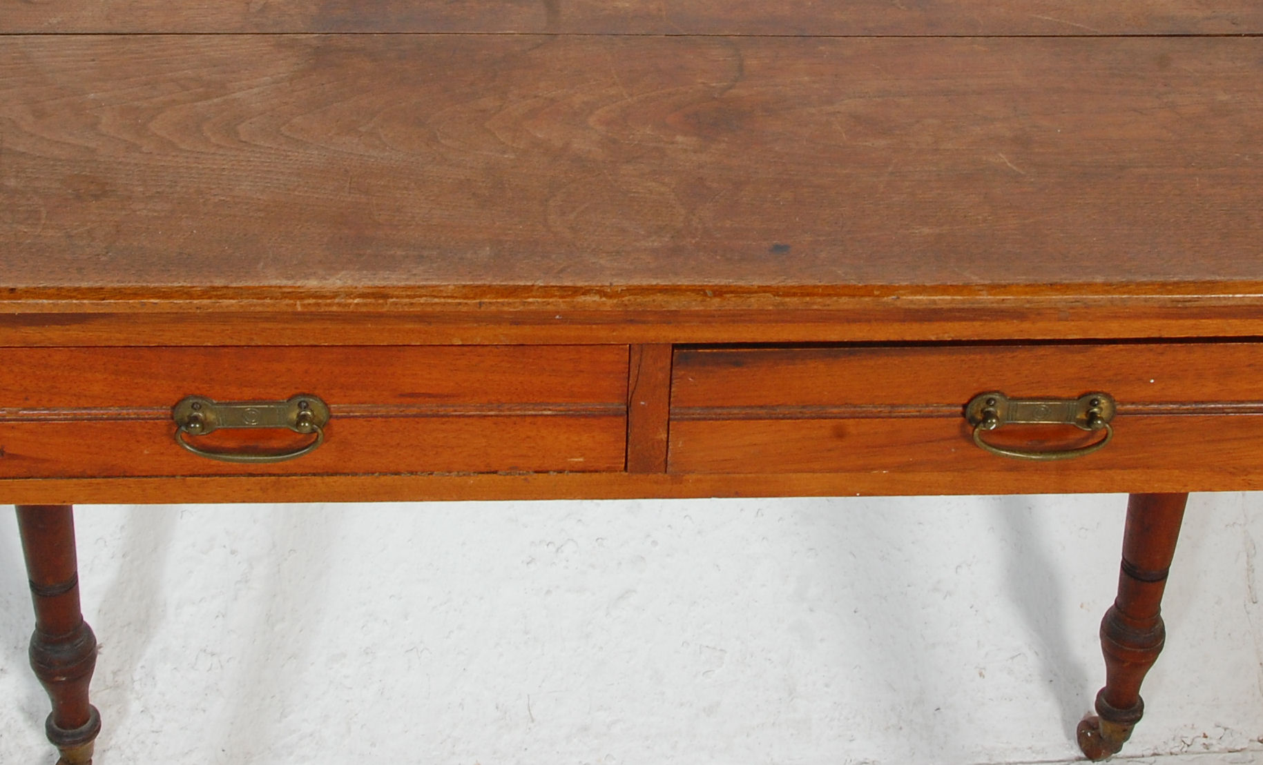 A late Victorian ash / oak writing table desk being raised on turned legs with castors having frieze - Image 3 of 6