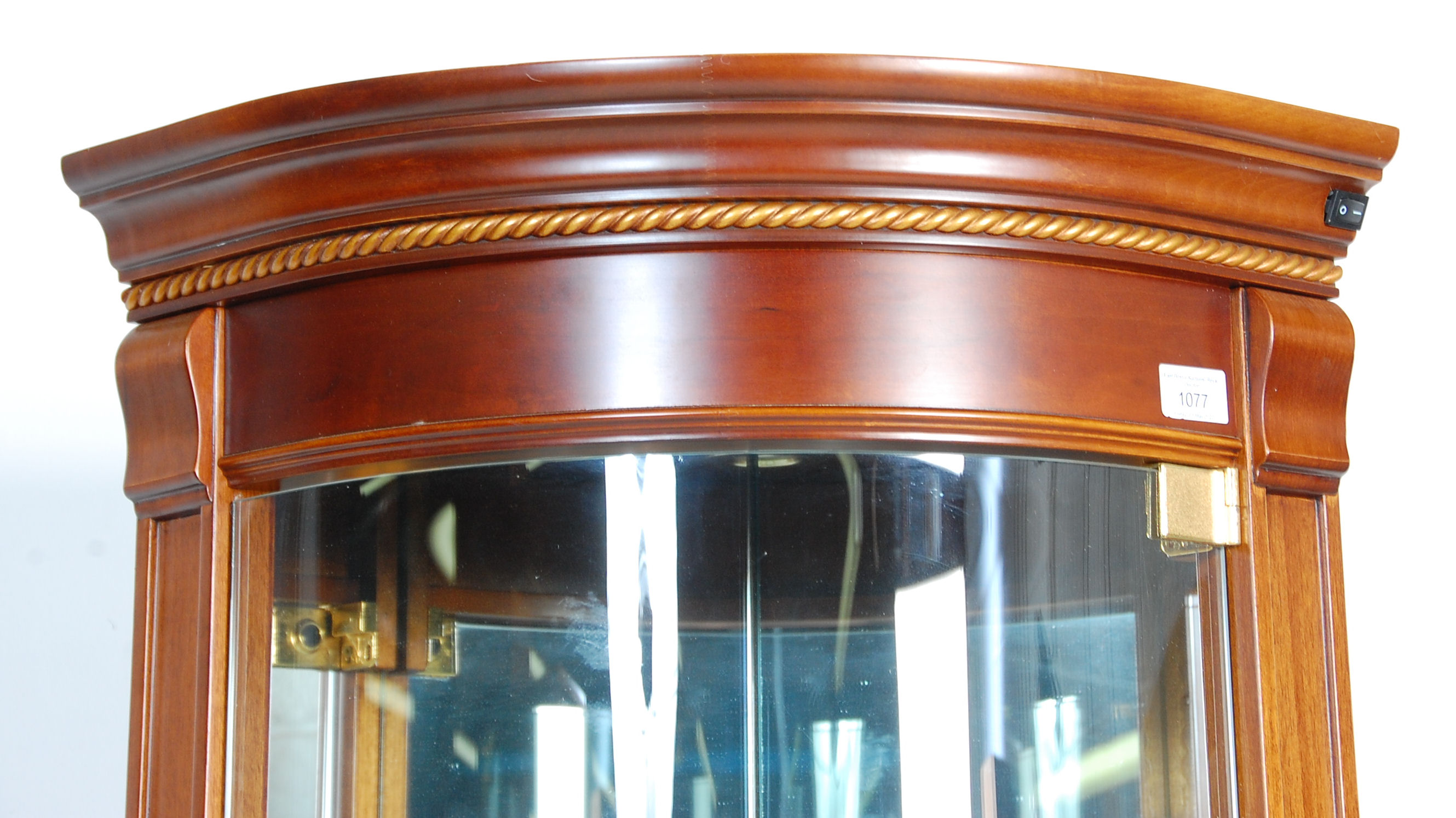 A 20th Century vintage shop display corner cabinet having a glazed bow front with glass shelves - Image 2 of 5
