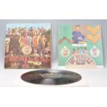 A vinyl long play LP record album by The Beatles – Sgt Pepper's Lonely Hearts Club Band – Original