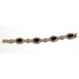 A good vintage 20th Century silver and marcasite ladies bracelet set with onyx set panels. Stamped