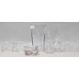 A collection of 20th Century etched glass ornaments to include a cut glass vase in with etched