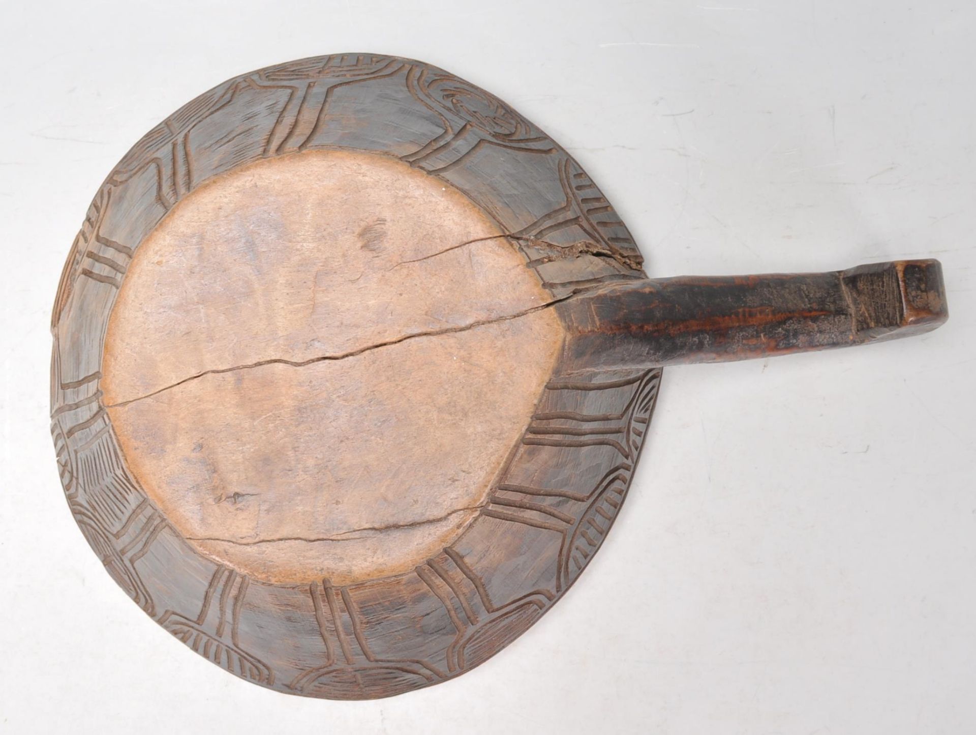 A antique African carved hardwood tribal bowl of conical form having a large carved handle to one - Bild 6 aus 6