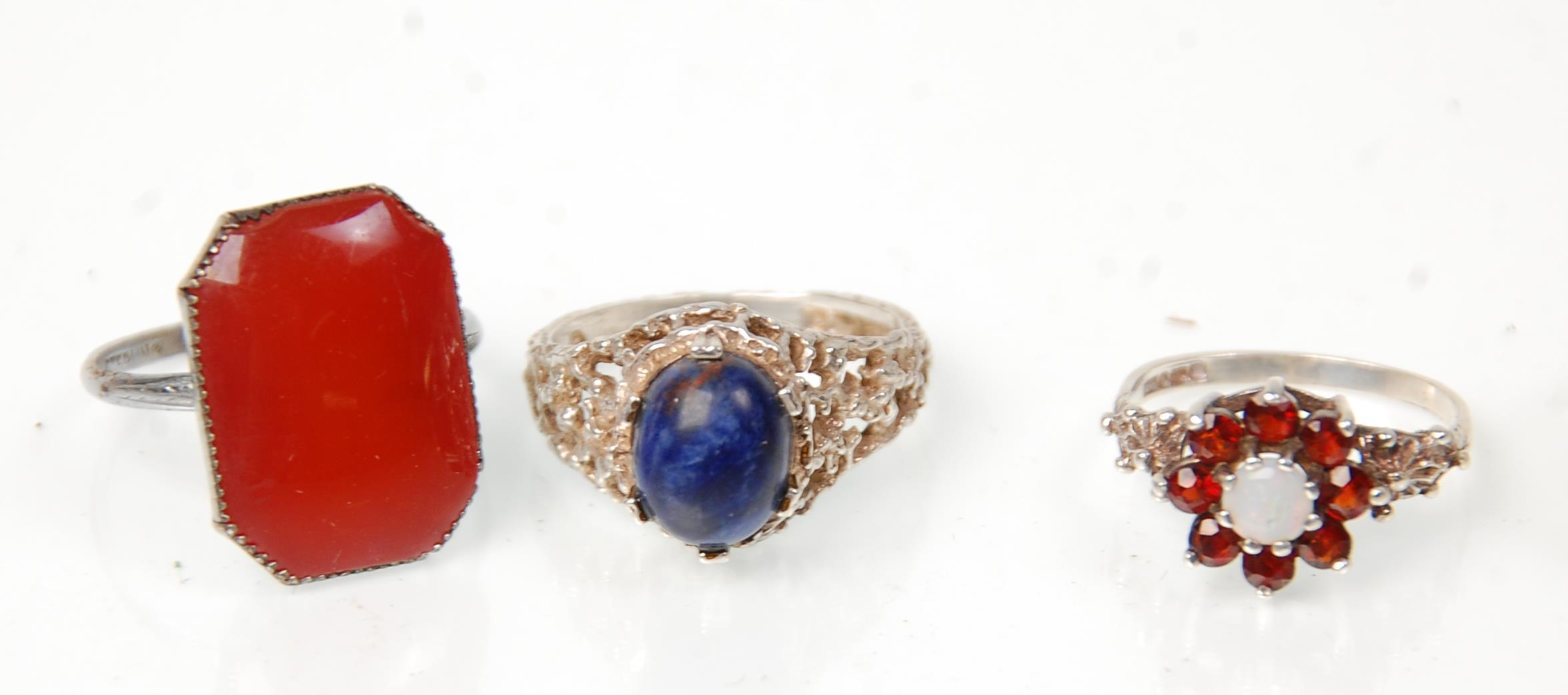 A group of seven silver rings to include a green stone panel ring (possibly jade) a lapis lazuli set - Image 2 of 6