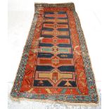 A good vintage 20th Century hand woven Persian / Islamic floor rug / runner having a red and blue