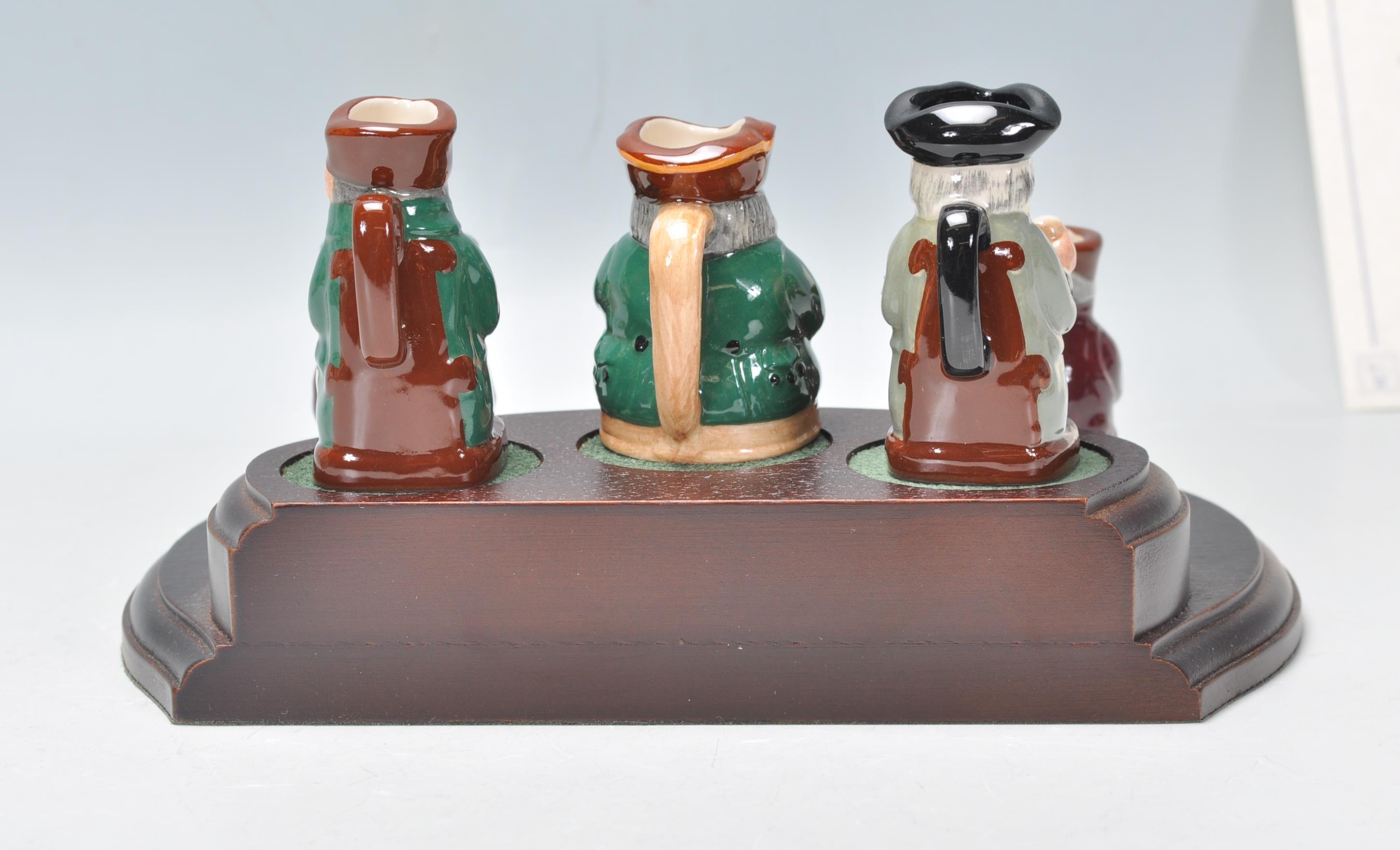 A group of six Royal Doulton miniature toby jugs from the Tiny Tobies collection, presented on a - Image 4 of 10