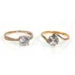 Two 9ct gold ladies rings. One set with a large single CZ stone to the center with white accent