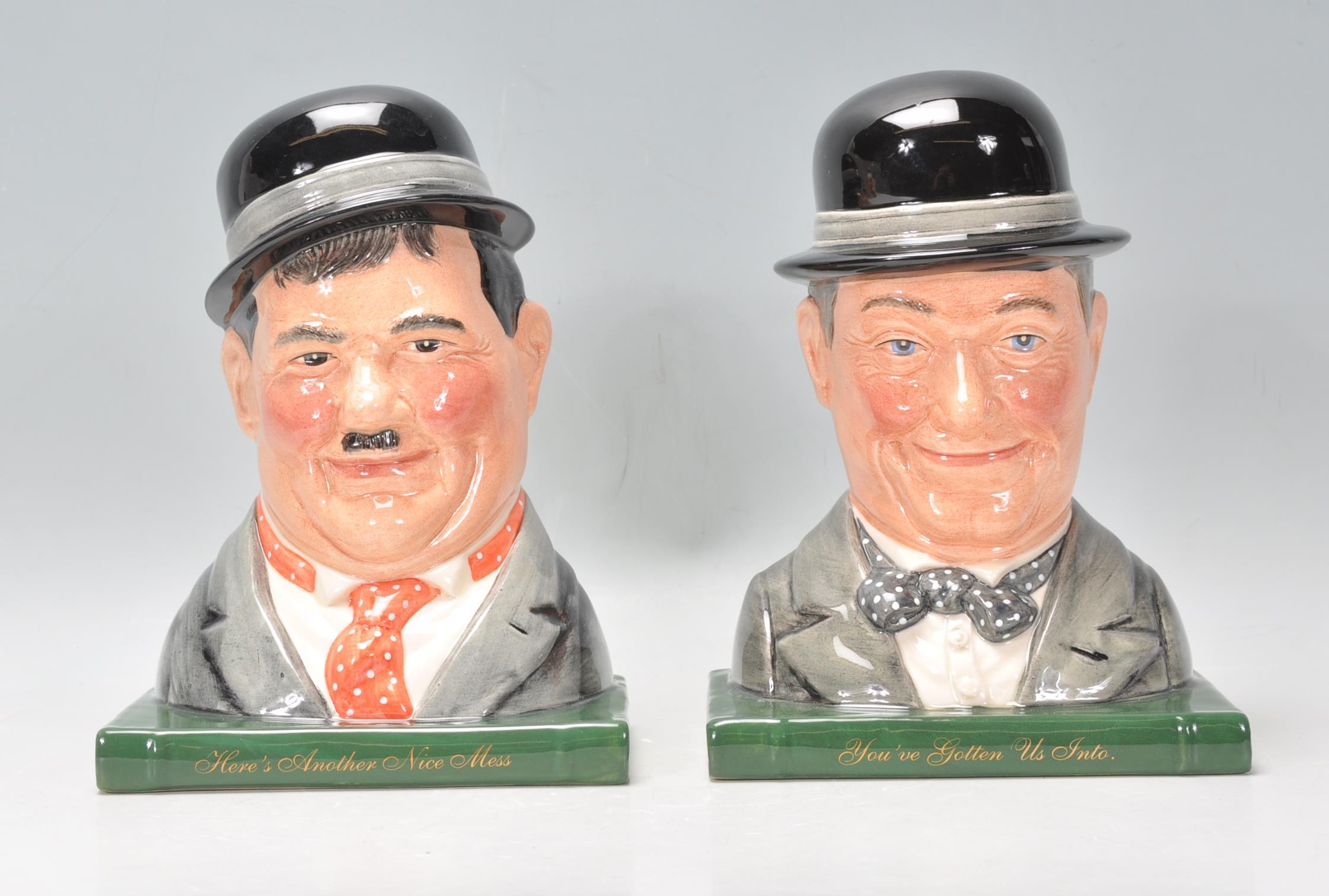A pair of Royal Doulton ceramic Laurel and Hardy character book ends. Oliver Hardy No. 7120 and Stan