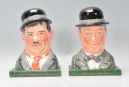 A pair of Royal Doulton ceramic Laurel and Hardy character book ends. Oliver Hardy No. 7120 and Stan