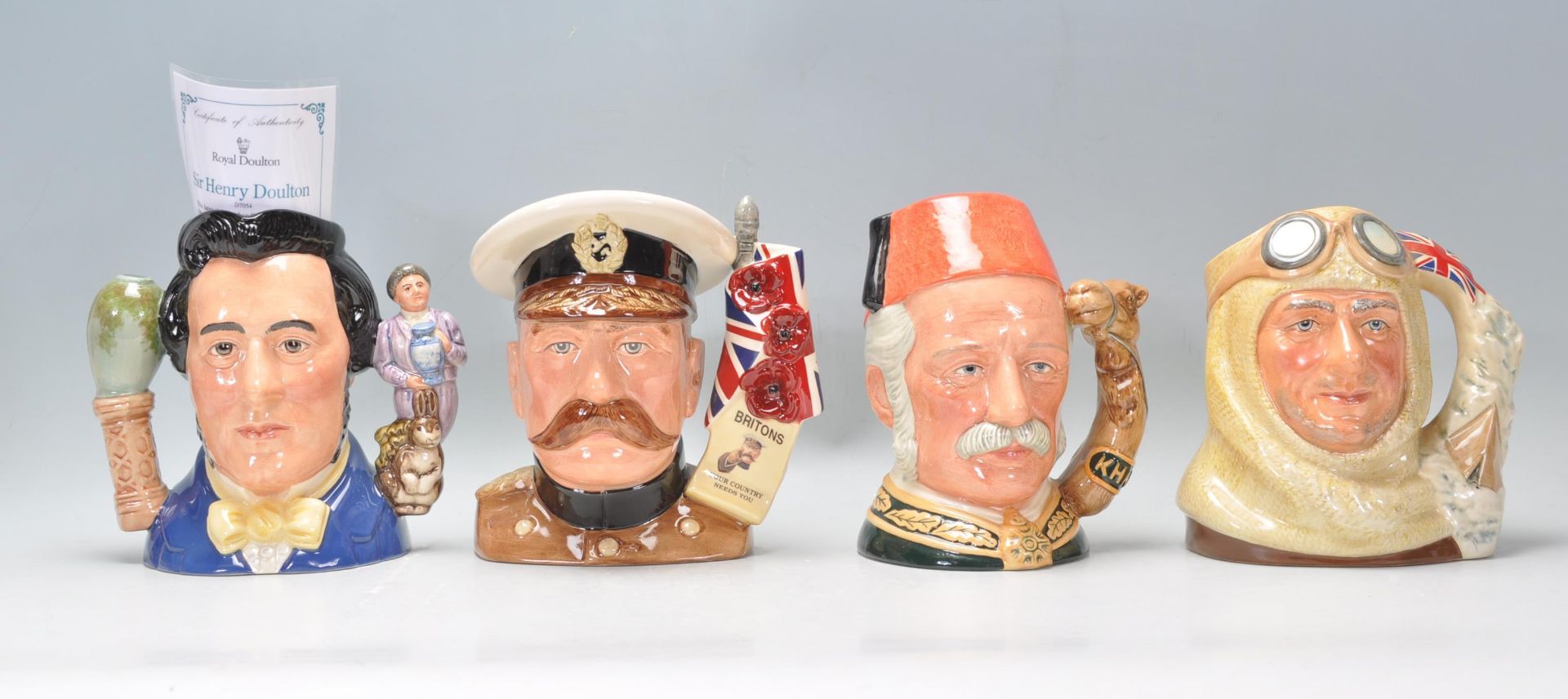 A group of four Royal Doulton character jugs to include Sir Henry Doulton D7054, Lord Kitchener