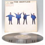 A vinyl long play LP record album by The Beatles – Help – Original Parlophone 1st U.K. Press – PMC