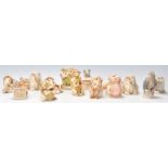 A Group of fourteen Harmony Kingdom novelty animals and magical creatures figurines to include an