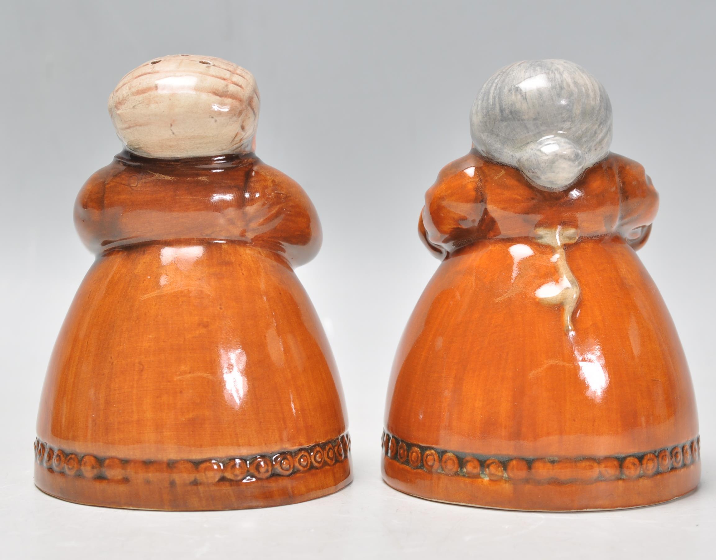 A pair of Royal Doulton salt and pepper pots entitled 'Votes for Women' and 'Toil for Men', D7066 - Image 4 of 6
