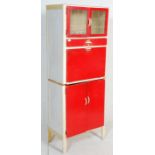 A vintage retro mid 20th Century 1950's kitchen unit having original red and white paint work,