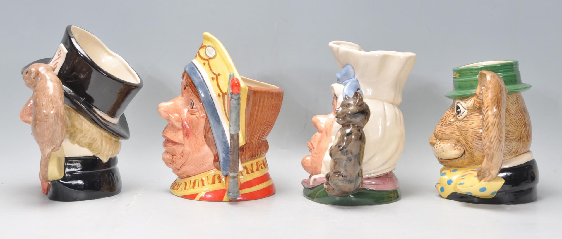 A group of four Royal Doulton ceramic character jugs to include Mad Hatter C6598, The March Hare D - Bild 4 aus 7