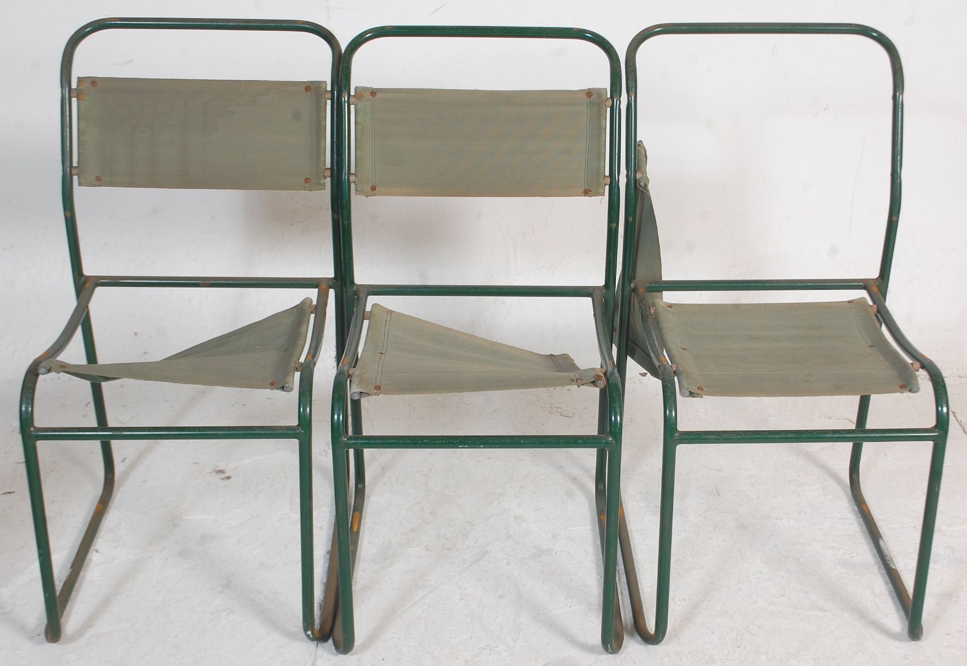 A group of six 20th Century vintage industrial military style tubular framed chairs having green - Bild 3 aus 3