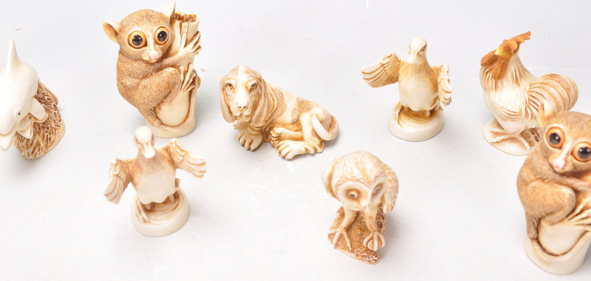 A group of twelve Harmony Kingdom resin animal figurines to include bush babies, owl, dolphin, duck, - Bild 3 aus 9