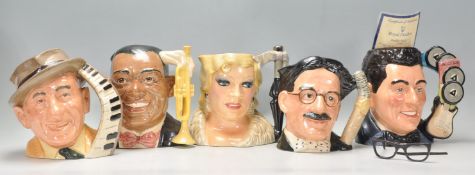A group of five Royal Doulton ceramic character jugs from the celebrity collection to include