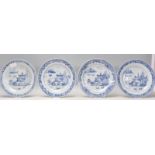 A group of four 19th Century Chinese blue and white plates of round form each similarly decorated