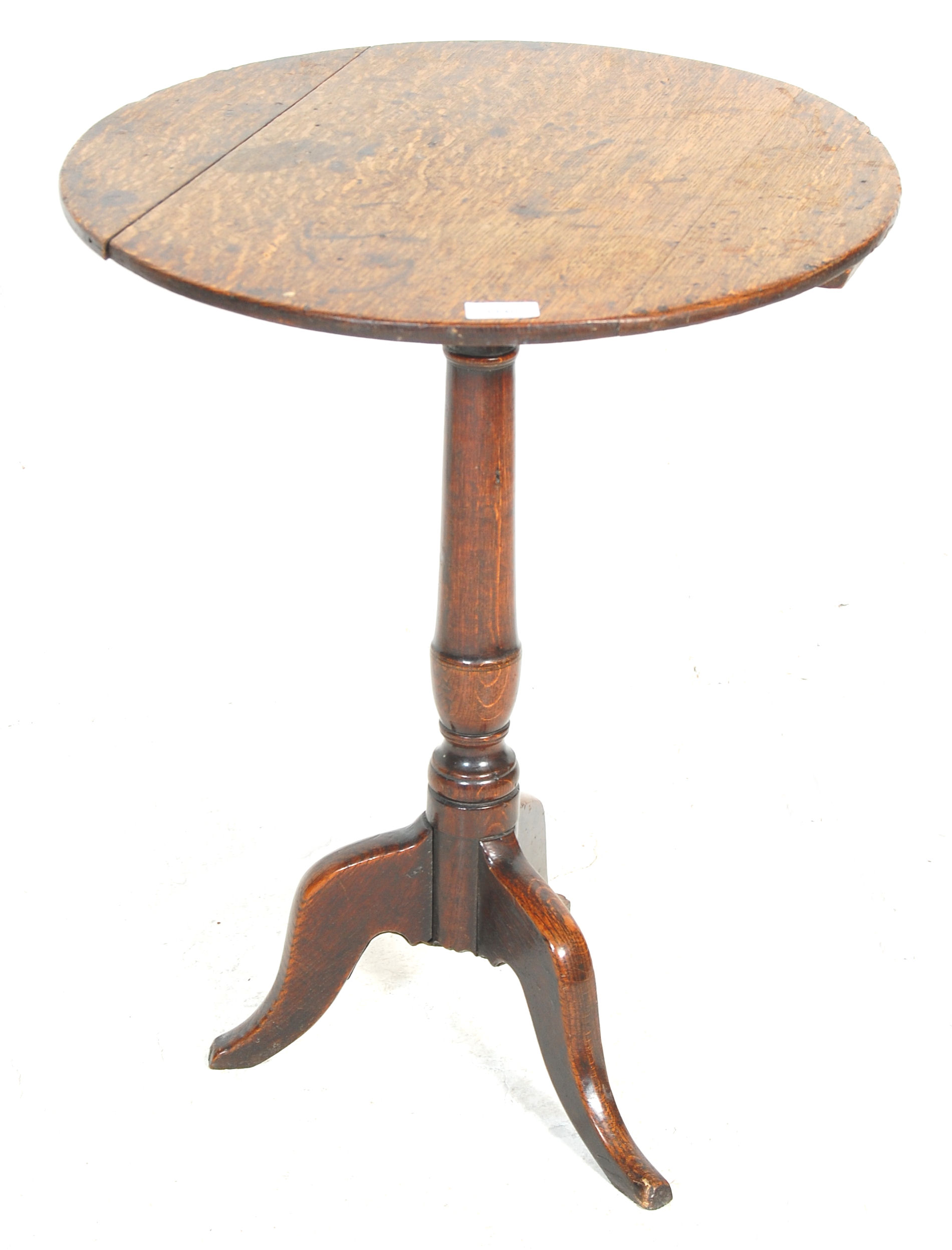 A 19th Century oak pedestal wine table having a round top with turned knopped column raised on a