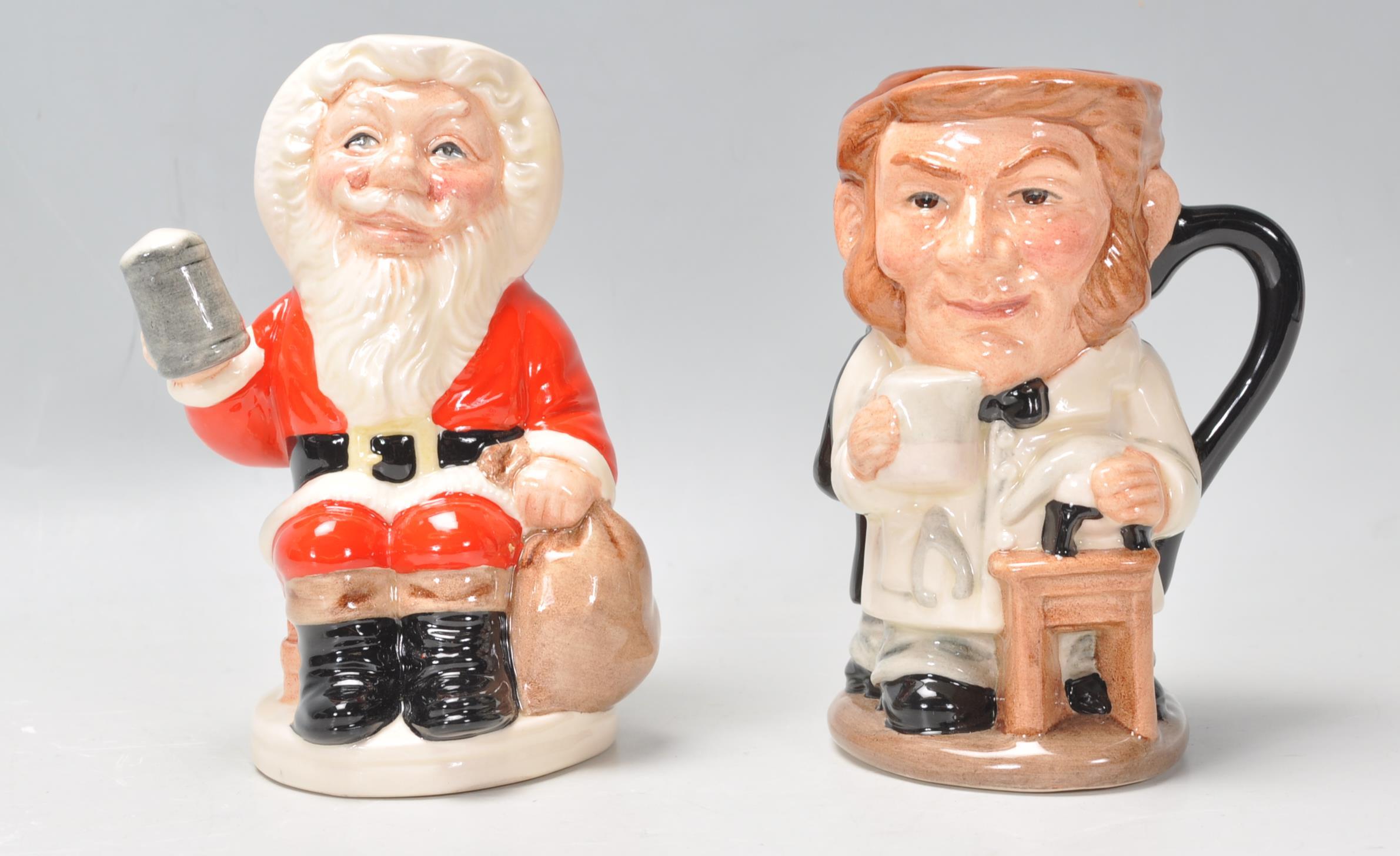 Two Royal Doulton ceramic Character / Toby jugs to include Father Christmas D6940 limited edition