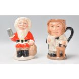 Two Royal Doulton ceramic Character / Toby jugs to include Father Christmas D6940 limited edition