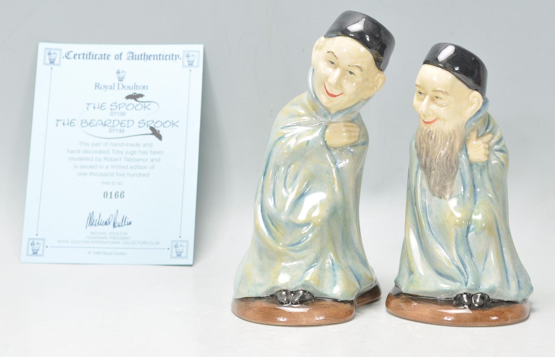 A pair of Royal Doulton ceramic character jugs to include 'The Spook' D7132 and 'The Bearded