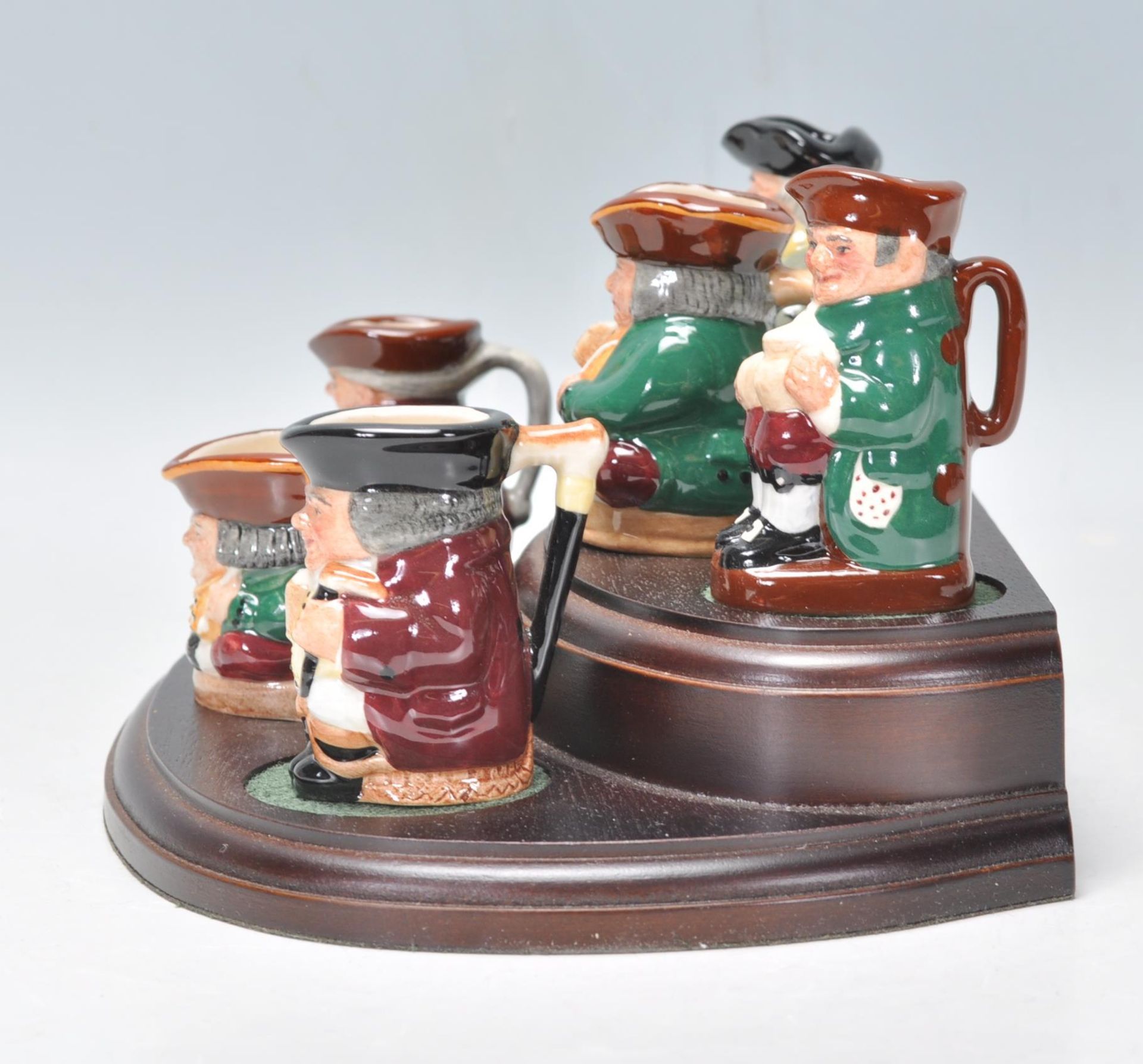 A group of six Royal Doulton miniature toby jugs from the Tiny Tobies collection, presented on a - Bild 5 aus 10