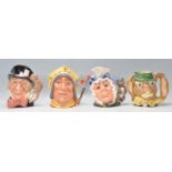 A group of four Royal Doulton ceramic character jugs to include Mad Hatter C6598, The March Hare D