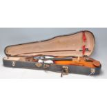 A 20th Century full size violin with two piece back and two bows. Paper label for Parrot to inner.