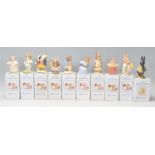 A group of nine Royal Albert 'The World Of Beatrix Potter' ceramic figures to include Mrs Ribby,