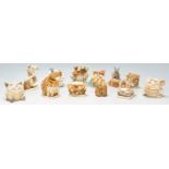 A group of twelve Harmony Kingdom resin animal novelty figurines / trinket pots to include Sheba's