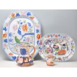 A collection of 19th Century ironstone ceramics to include two large polychrome chinoiserie meat