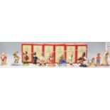 A group of twelve Royal Doulton Bunnykins ceramic figures to include an unusual Santa Bunnykins "