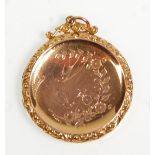 A lovely Victorian 9ct gold back and front round locket having engraved swallow and floral