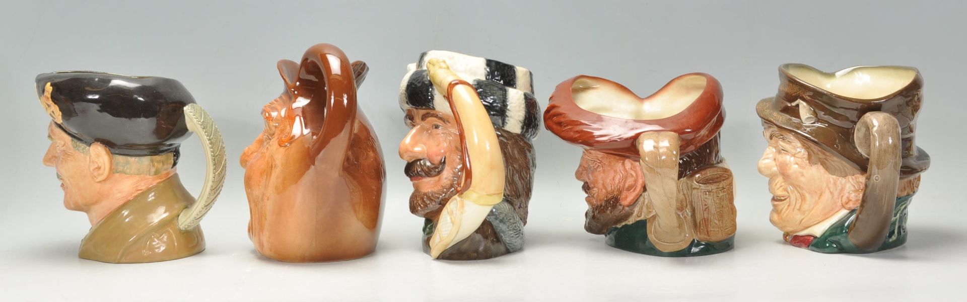 A group of five Royal Doulton character jugs to include The Trapper D6609, Monty D6202, Paddy, and - Bild 4 aus 10