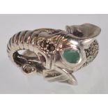 A stamped 925 silver ring in the form of  an elephant set with red and green stones, and marcasites.