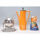 A vintage retro 20th Century Portmeirion coffee pot having an orange body with angular handle and