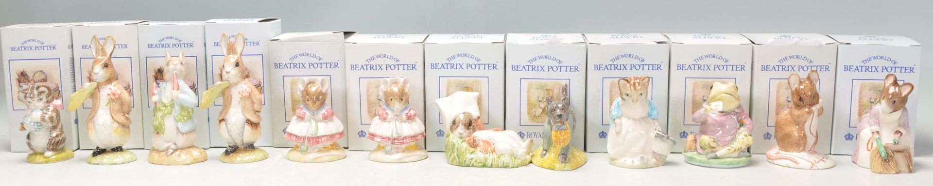 A group of twelve Royal Albert ceramic figures in 'The World Of Beatrix Potter Collection' to